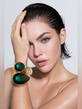 Statement cuff bracelet with gorgeous large emerald green glass stones